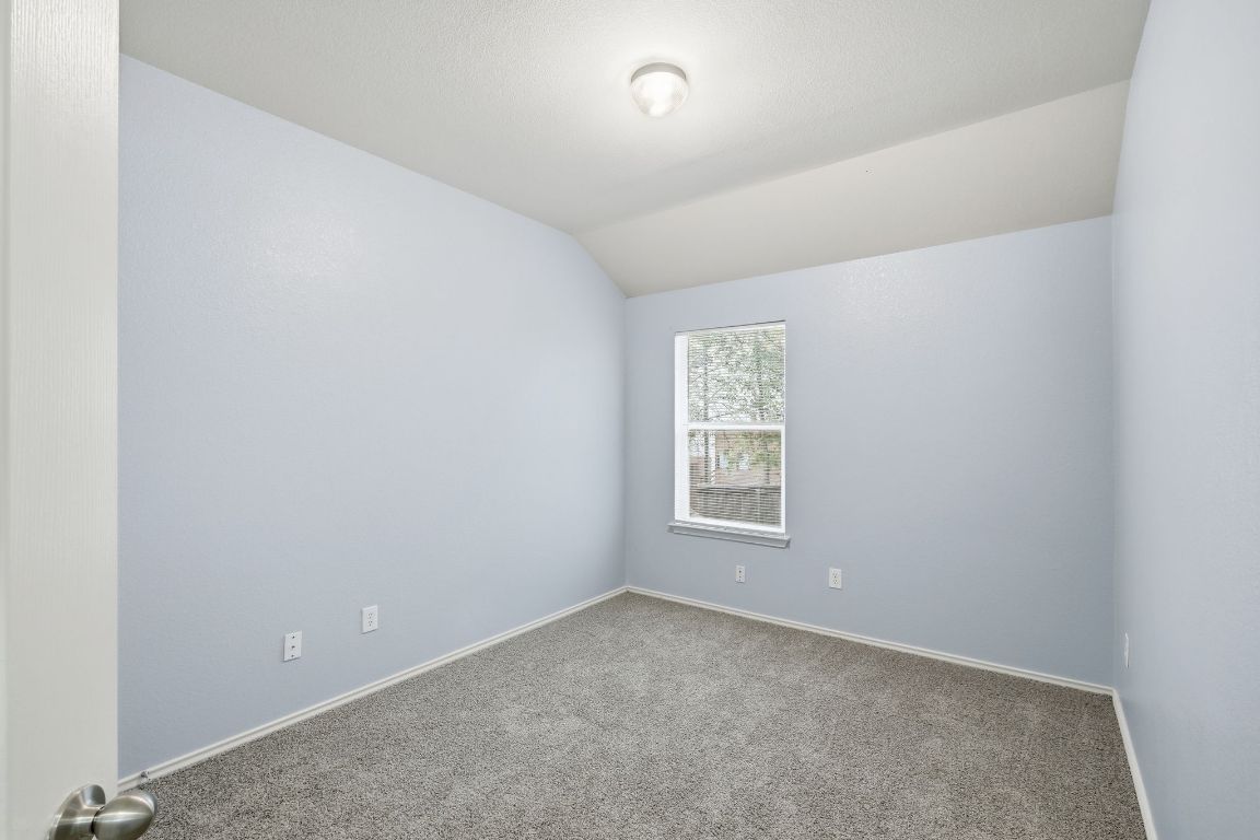 1910 Rachel Lane Round Rock, TX 78664 - Photo 12 of 17 an empty room with windows