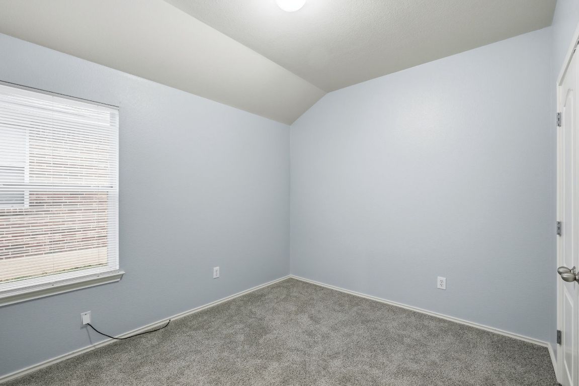 1910 Rachel Lane Round Rock, TX 78664 - Photo 15 of 17 an empty room with a window