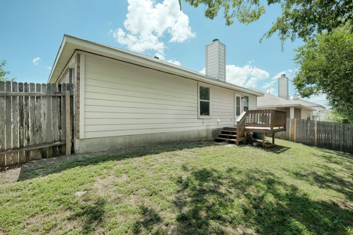 1910 Rachel Lane Round Rock, TX 78664 - Photo 16 of 17 a view of a house with backyard and sitting area