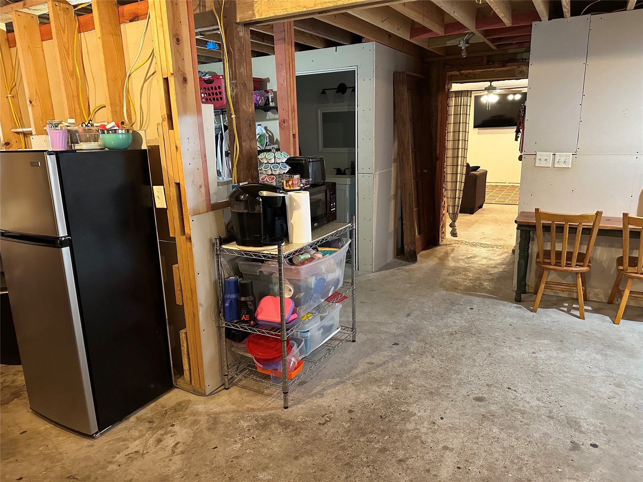 641 Baxter Street Garwood, TX 77442 - Photo 14 of 33 an outdoor space with lots of furniture and refrigerator