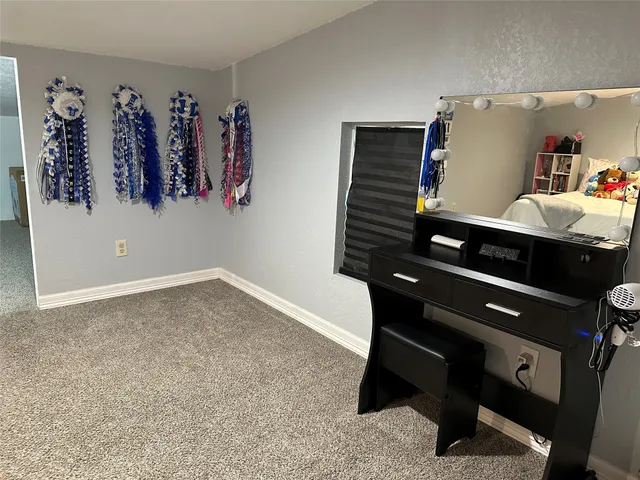 a room with furniture and window