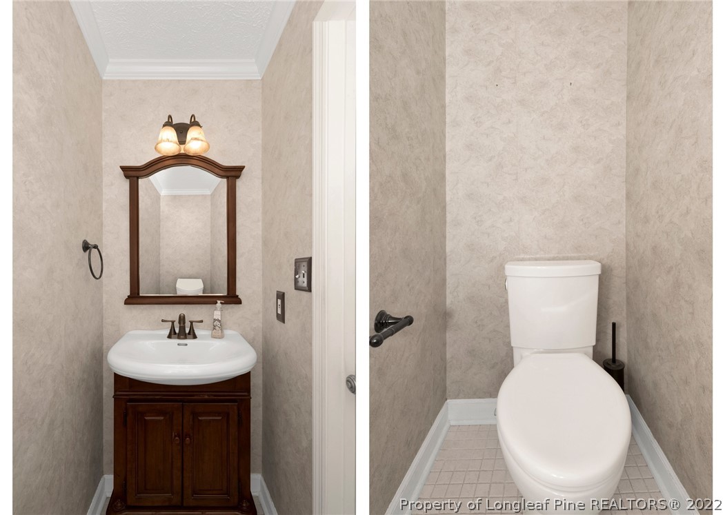 338 Lionshead Road Fayetteville, NC 28311 - Photo 20 of 39 a bathroom with a toilet sink and mirror