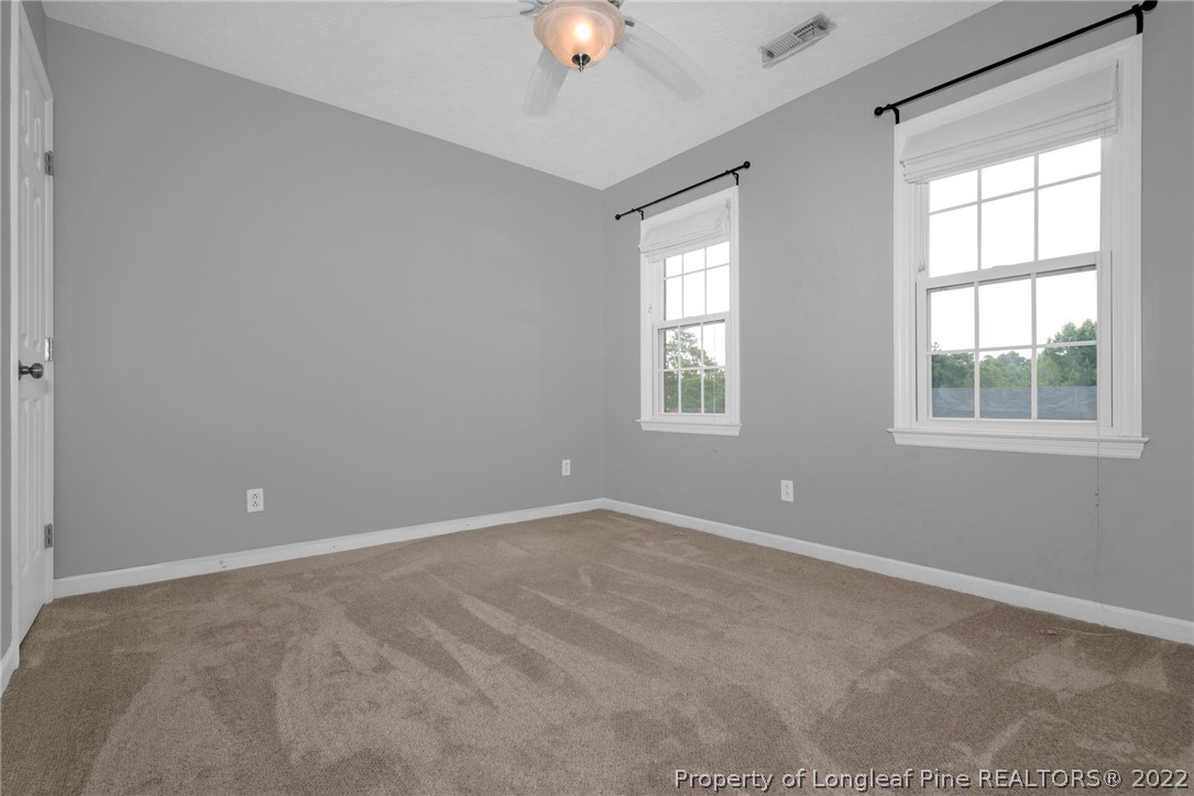 338 Lionshead Road Fayetteville, NC 28311 - Photo 21 of 39 a view of an empty room with a window