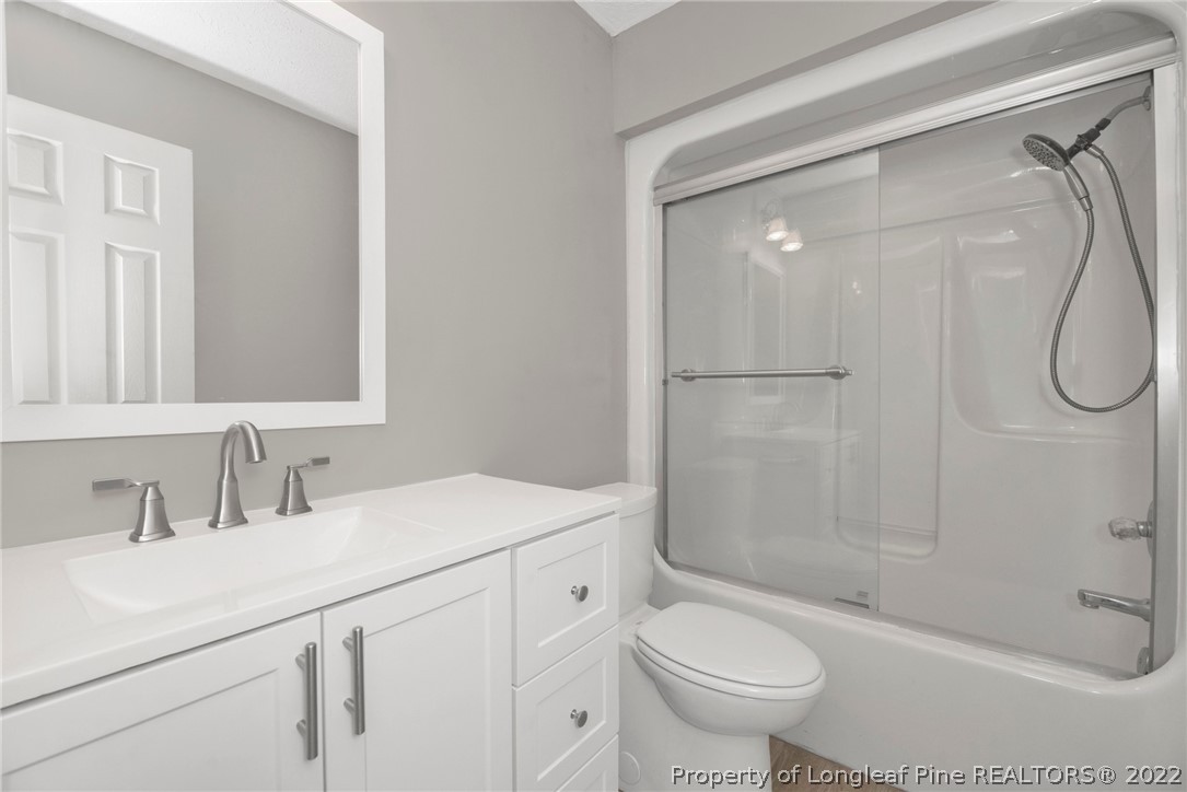 338 Lionshead Road Fayetteville, NC 28311 - Photo 23 of 39 a bathroom with a sink toilet and shower