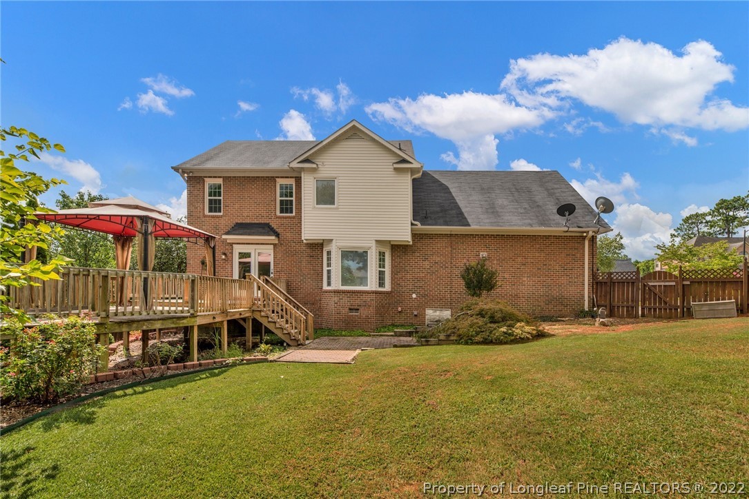 338 Lionshead Road Fayetteville, NC 28311 - Photo 34 of 39 a view of a house with a yard