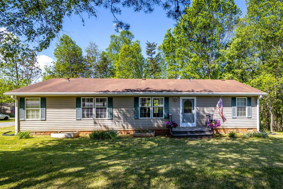 10 Tolley Road Hardy, VA 24101 - Photo 1 of 25 a front view of a house with a garden