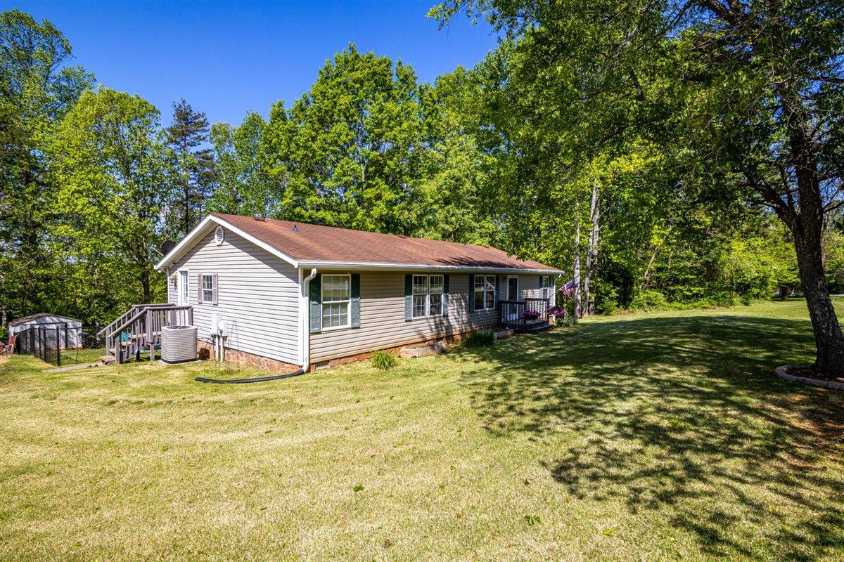 10 Tolley Road Hardy, VA 24101 - Photo 2 of 25 a house view with a garden space