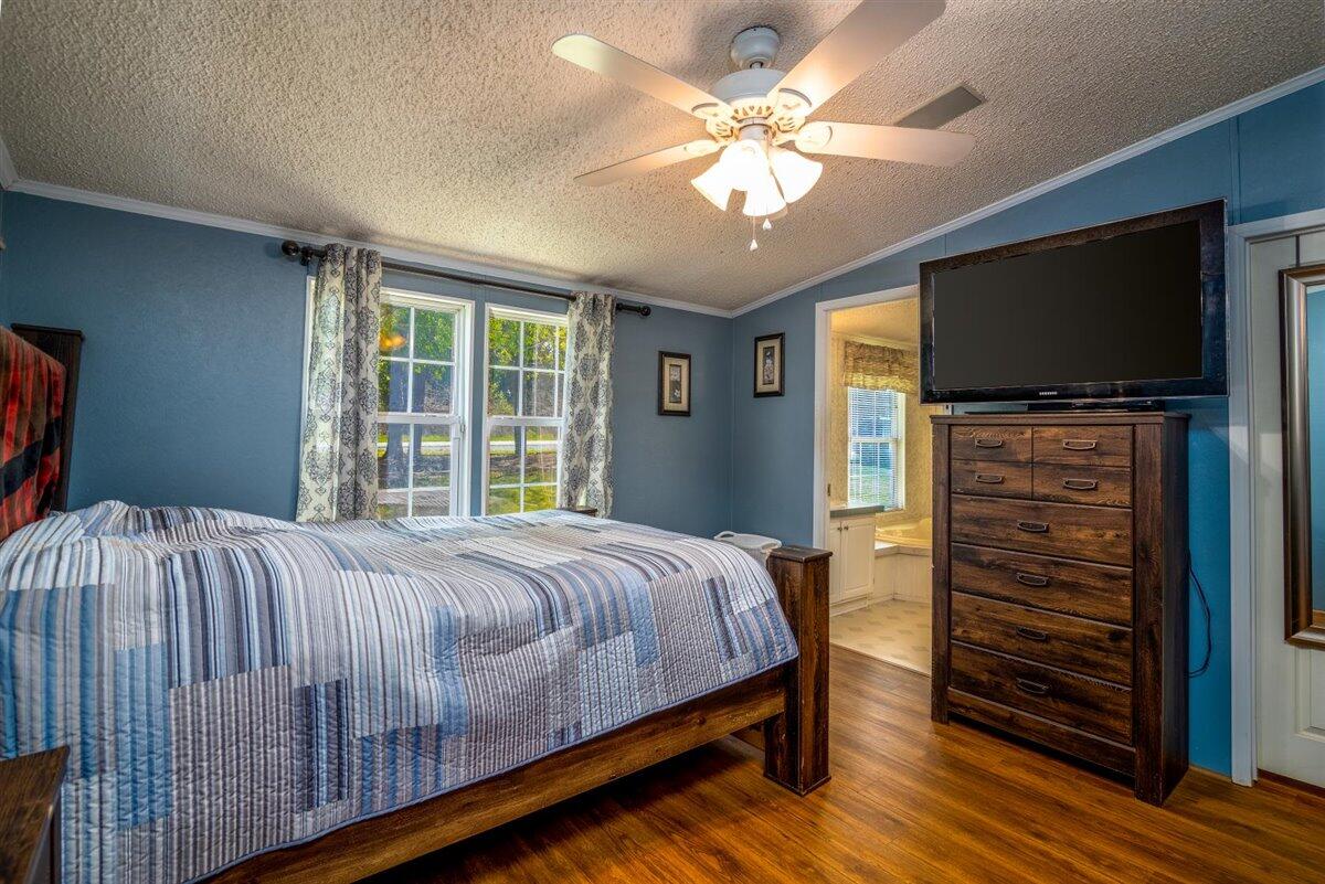 10 Tolley Road Hardy, VA 24101 - Photo 15 of 25 a bedroom with a bed and a flat screen tv