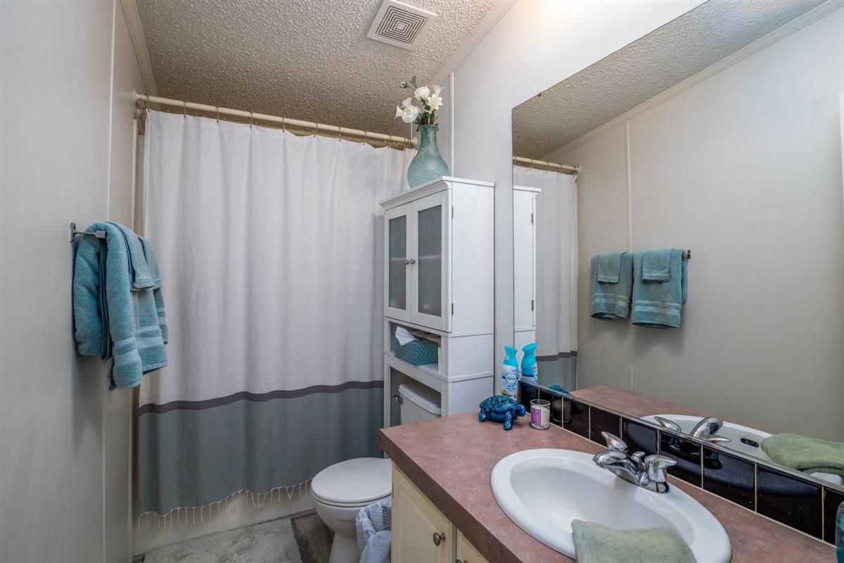 10 Tolley Road Hardy, VA 24101 - Photo 19 of 25 a bathroom with a sink toilet and shower