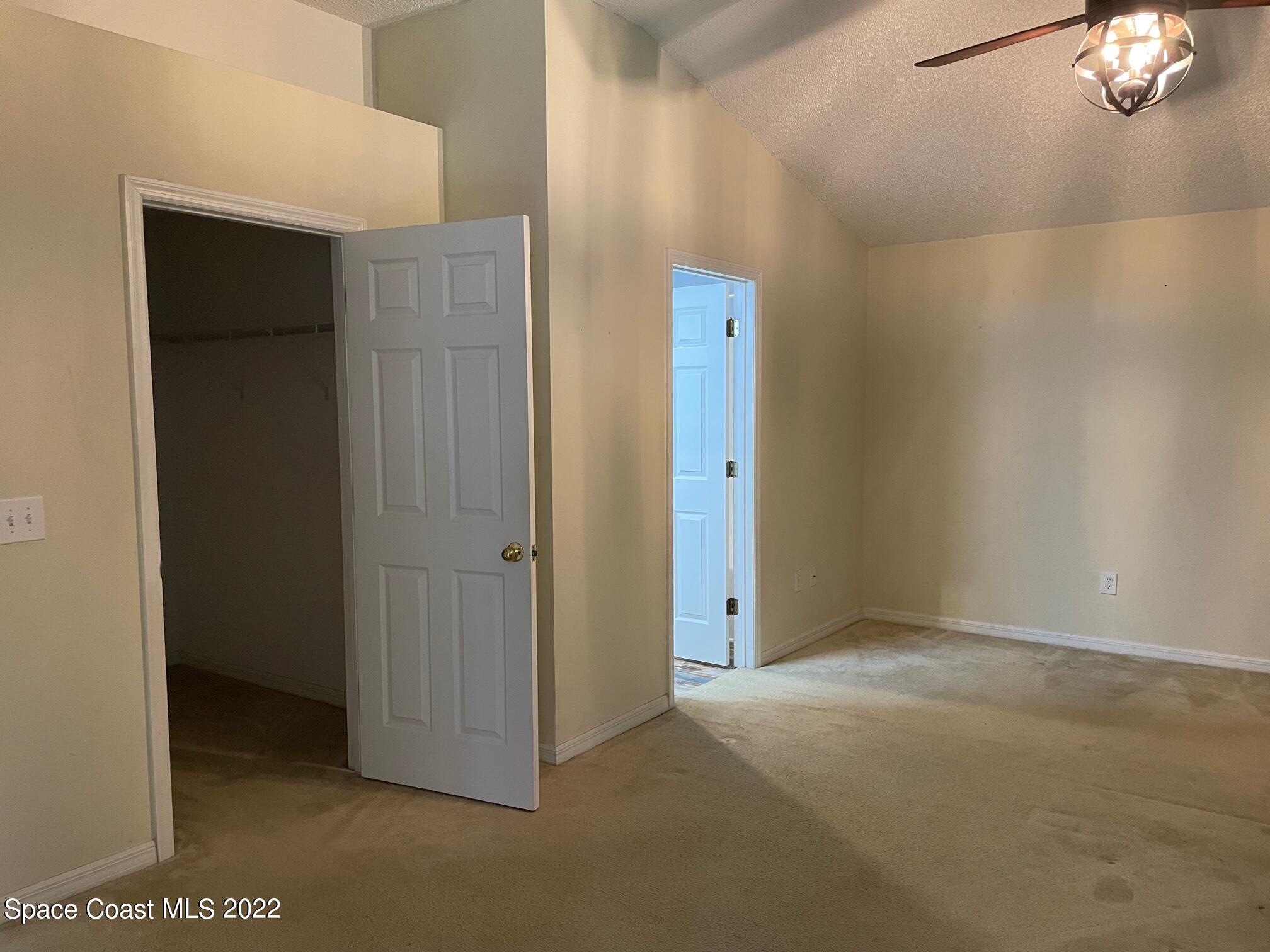 701 Lavender Street Southeast Palm Bay, FL 32909 - Photo 15 of 34 Door to closet