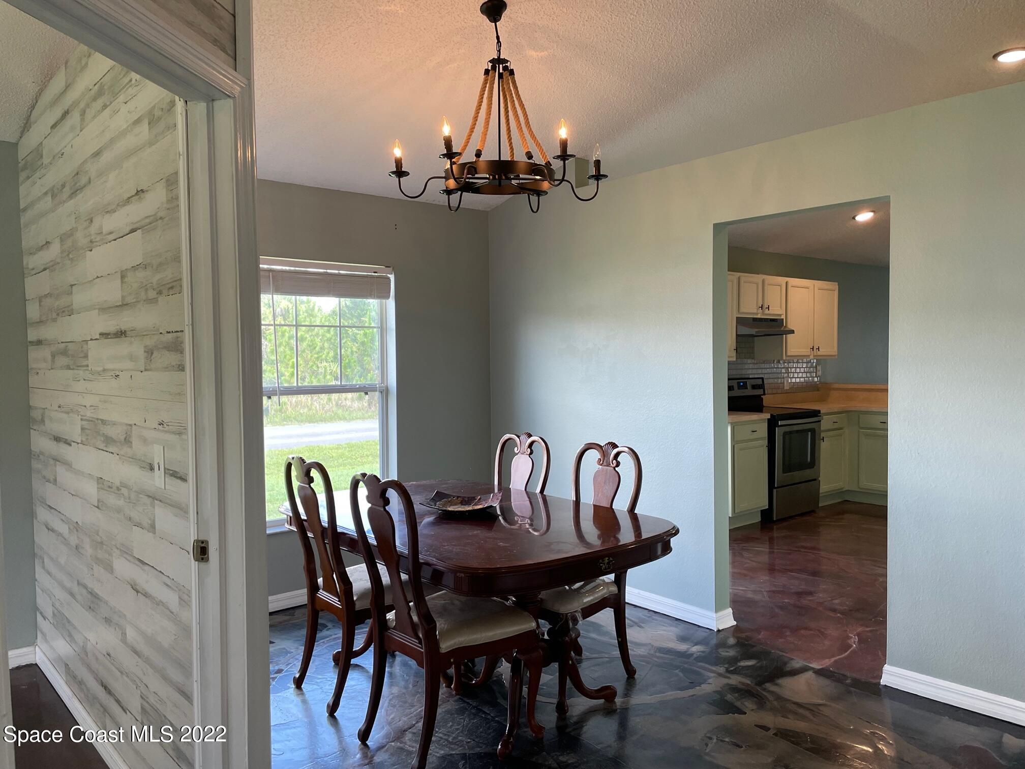 701 Lavender Street Southeast Palm Bay, FL 32909 - Photo 5 of 34 Dining Room