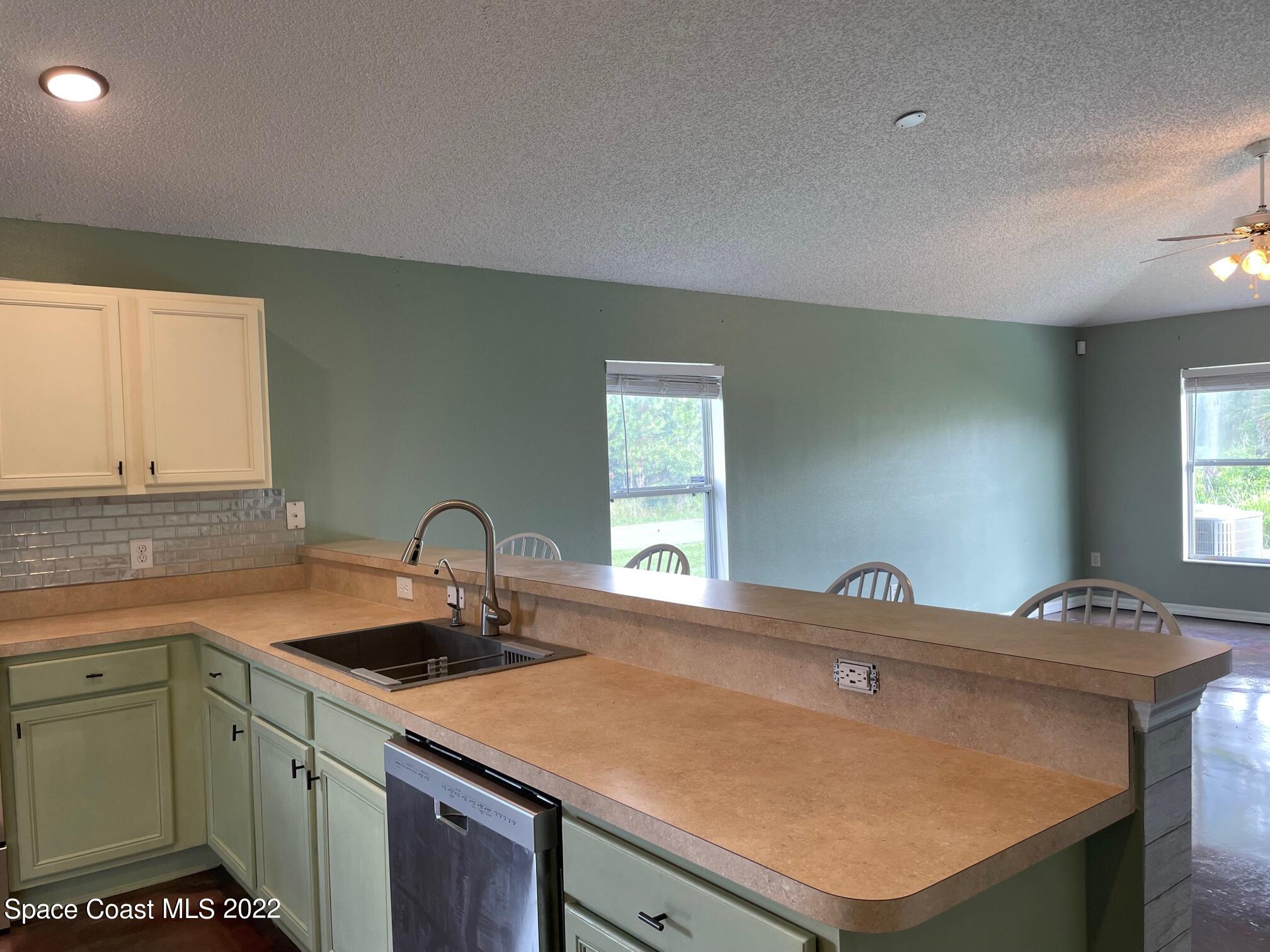 701 Lavender Street Southeast Palm Bay, FL 32909 - Photo 8 of 34 Open to Living