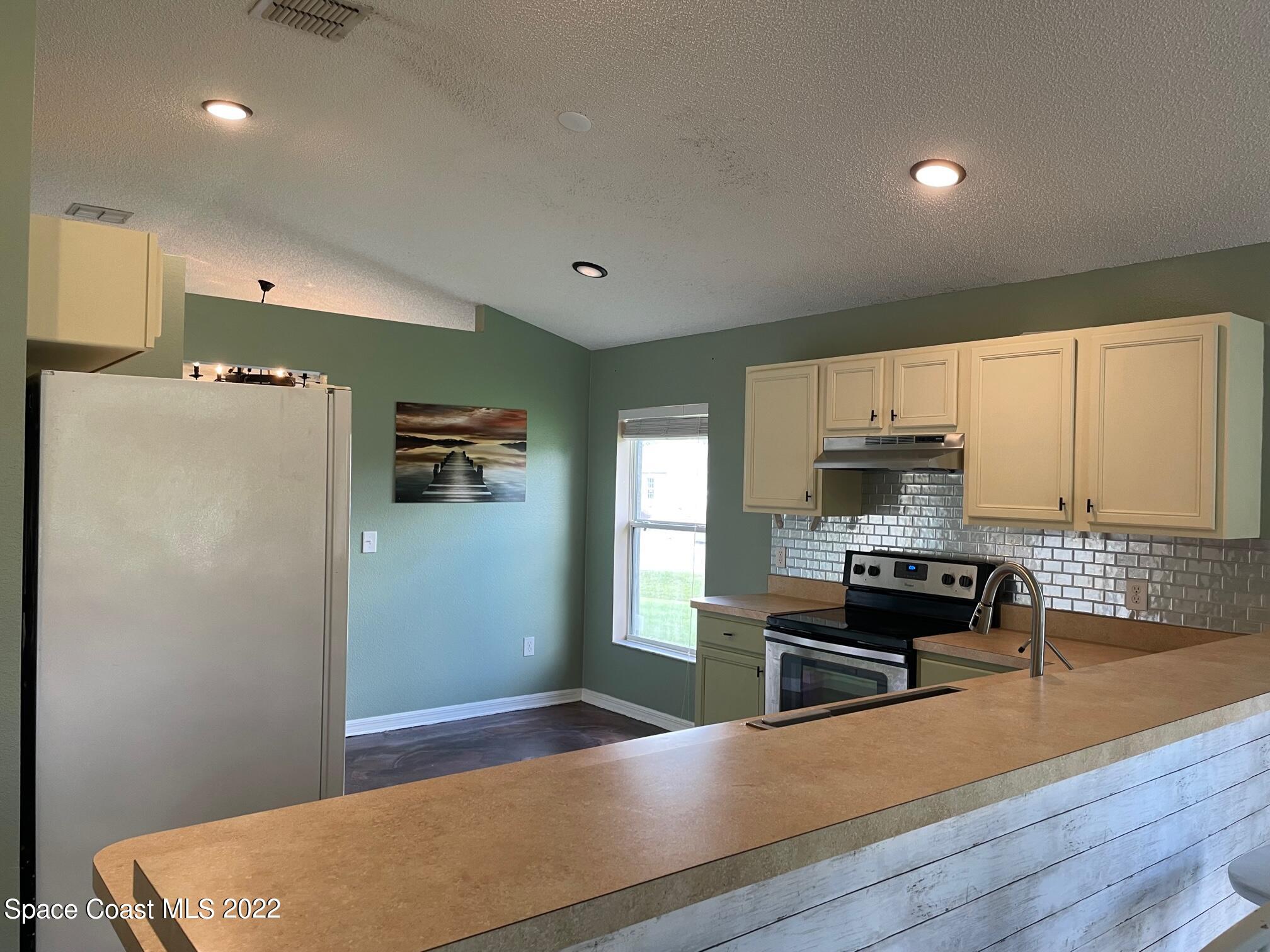 701 Lavender Street Southeast Palm Bay, FL 32909 - Photo 9 of 34 Breakfast Nook