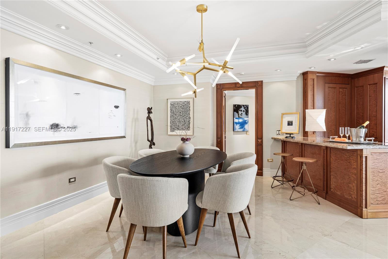 808 Brickell Key Drive, Unit 1802 Miami, FL 33131 - Photo 11 of 43 a view of a a dining room with furniture window and wooden floor