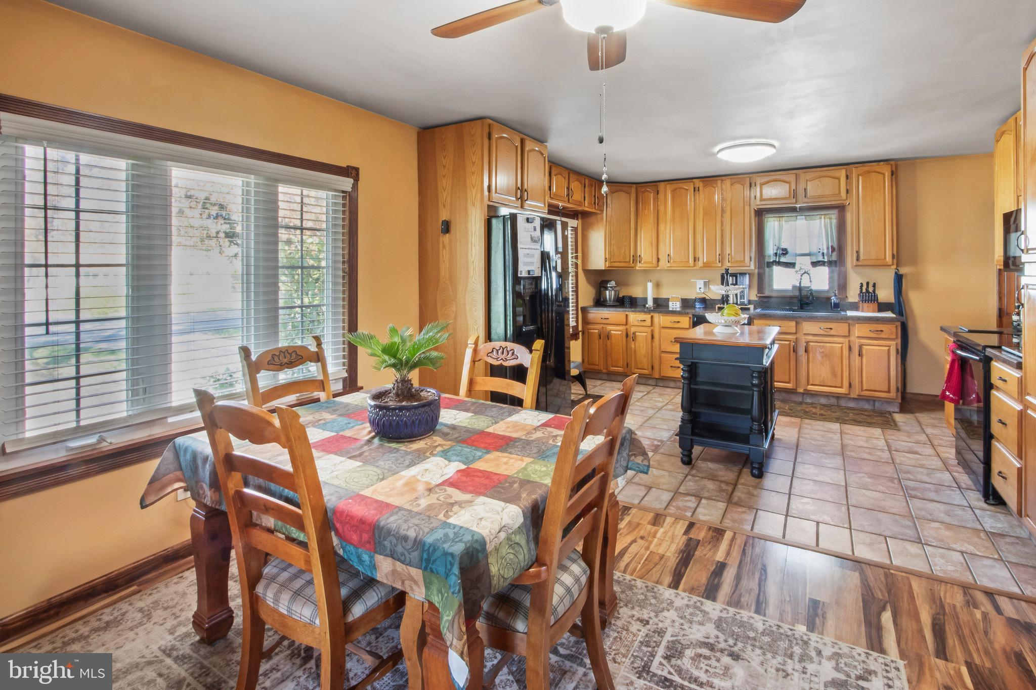 10 South Hook Road Pennsville, NJ 08070 - Photo 15 of 40 a view of a dining room with furniture window and outside view