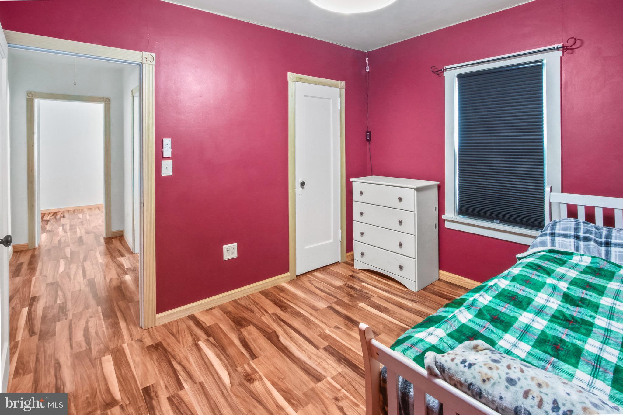 10 South Hook Road Pennsville, NJ 08070 - Photo 22 of 40 a bed room with a bed and a dresser