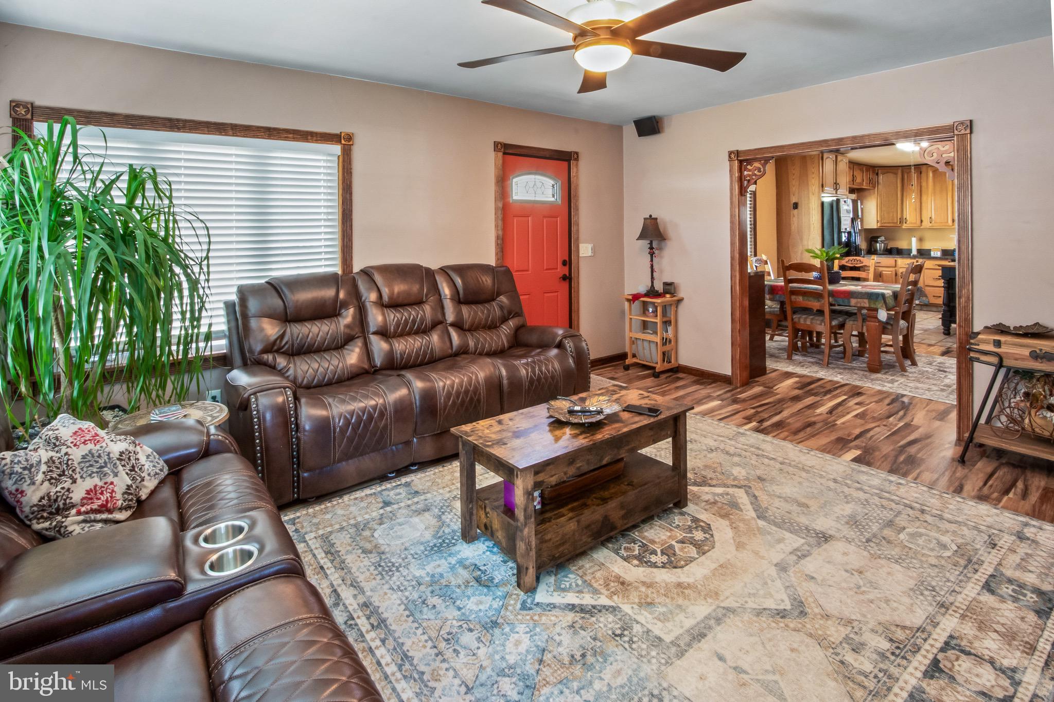 10 South Hook Road Pennsville, NJ 08070 - Photo 6 of 40 a living room with furniture and a large window