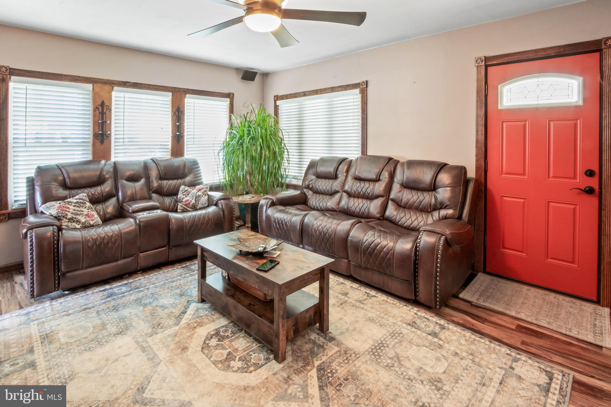 10 South Hook Road Pennsville, NJ 08070 - Photo 7 of 40 a living room with furniture and a large window