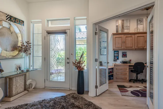 a workspace with furniture and window