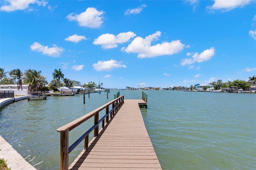 708 Sunset Cove Madeira Beach, FL 33708 - Photo 3 of 61 a view of river and deck