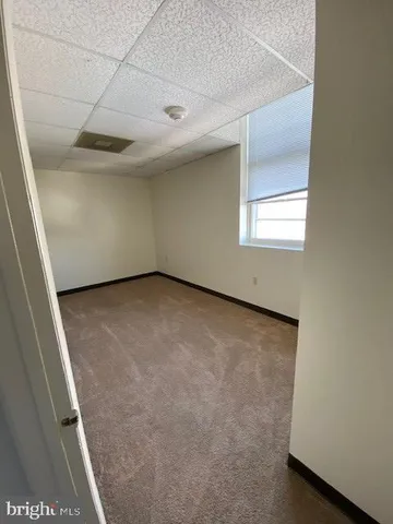 an empty room with a workbench