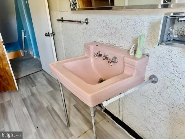 a bath tub sitting in a bathroom