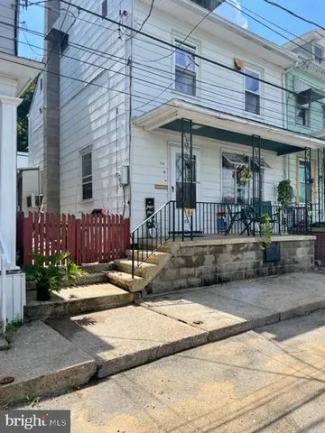 a view of a house with a patio