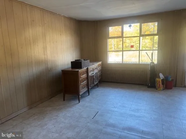 a room with furniture and a window