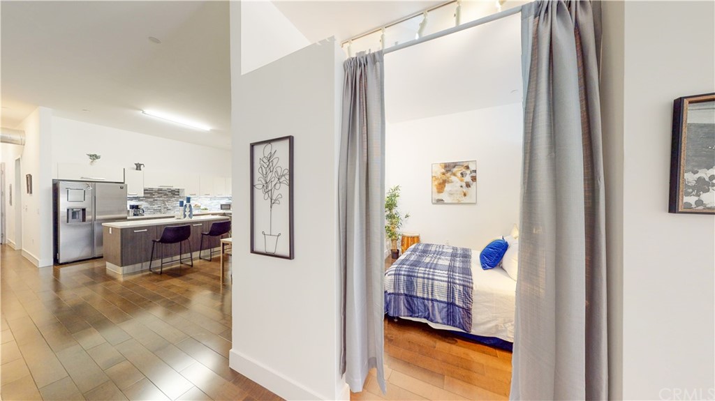 433 Pine Avenue, Unit 308 Long Beach, CA 90802 - Photo 16 of 24 a view of kitchen with furniture and refrigerator