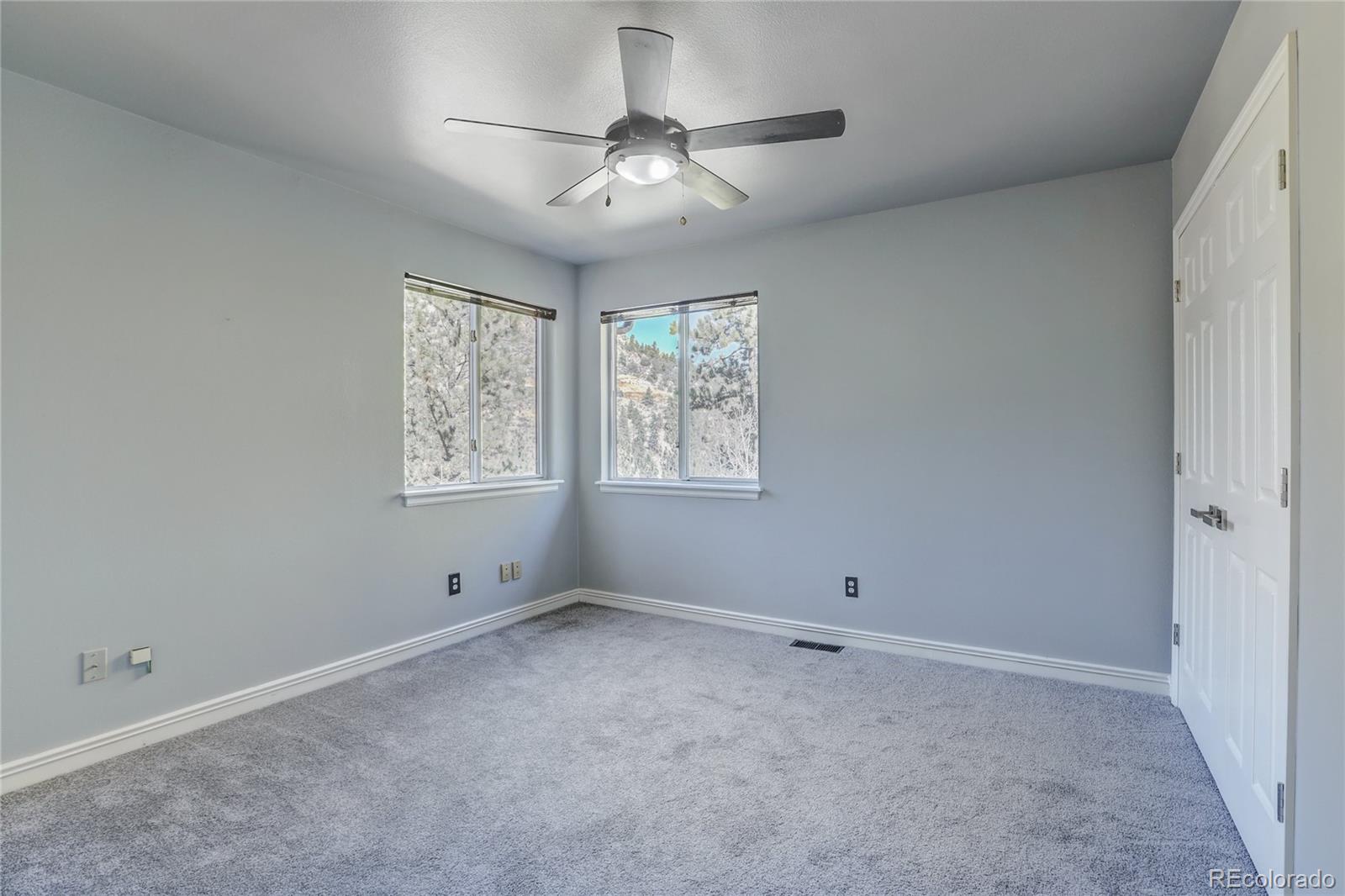 1469 Roland Drive Bailey, CO 80421 - Photo 17 of 39 a view of an empty room with a window