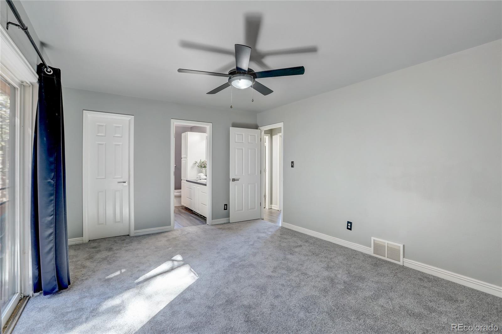 1469 Roland Drive Bailey, CO 80421 - Photo 23 of 39 a view of empty room with ceiling fan