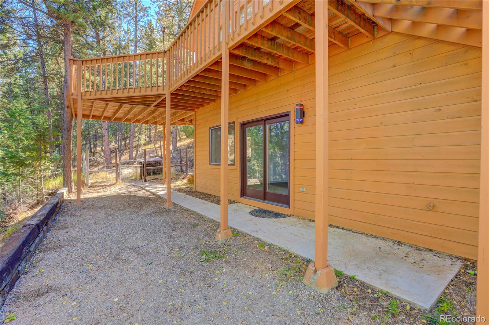 1469 Roland Drive Bailey, CO 80421 - Photo 32 of 39 a view of a house with a outdoor space