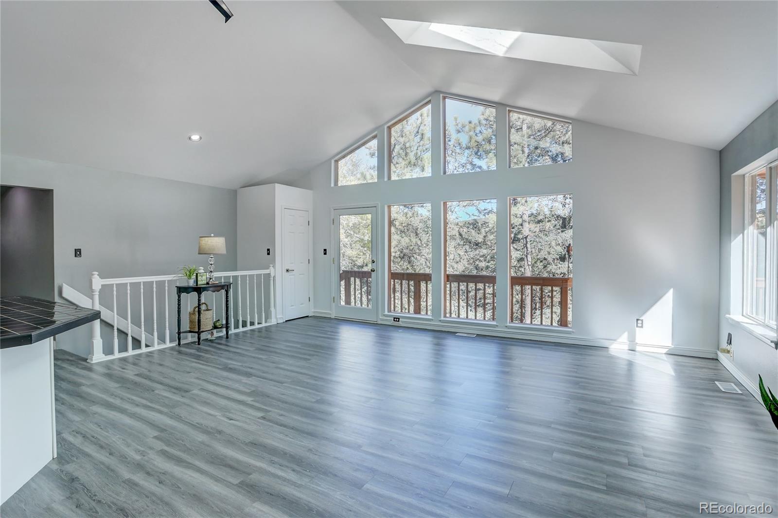1469 Roland Drive Bailey, CO 80421 - Photo 8 of 39 a view of an entryway with wooden floor