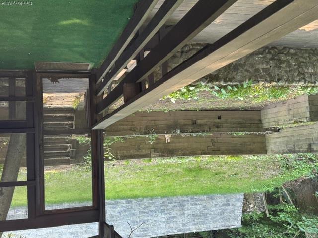 45 Upper Ritie Street Piermont, NY 10968 - Photo 13 of 28 Covered porch off kitchen facing back yard with large deck below.