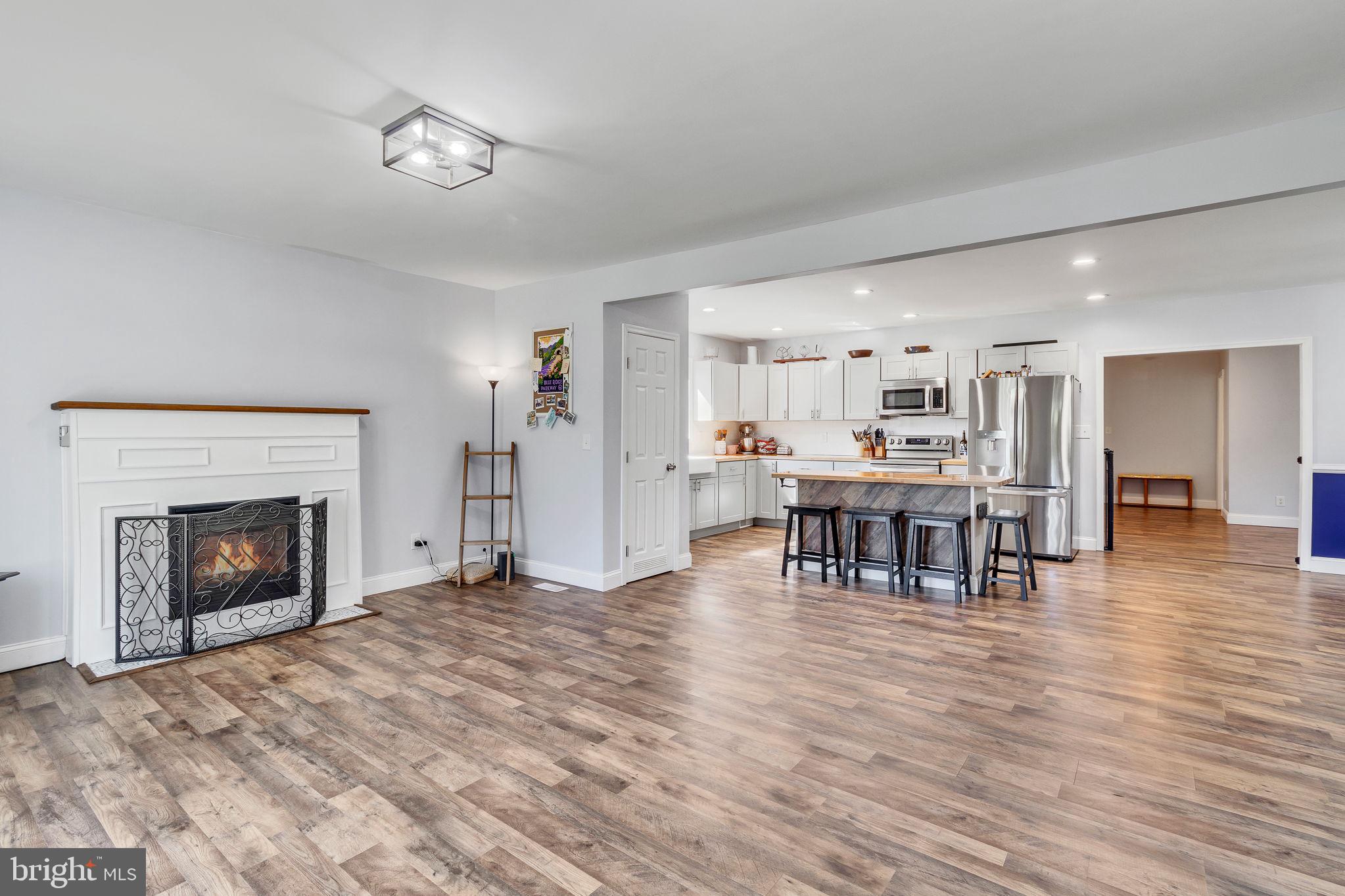 9832 River Road Lancaster, VA 22503 - Photo 12 of 68 Spacious modern living area with warmth.