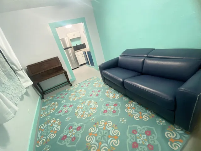 a living room with furniture and a couch