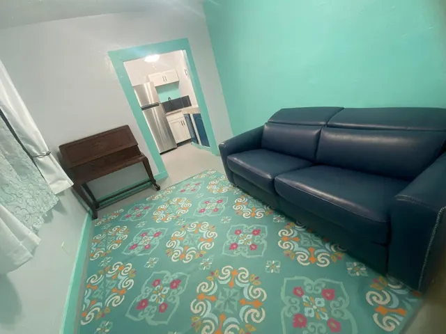 a living room with furniture and a couch