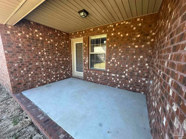 a view of a house with a swimming pool with a yard