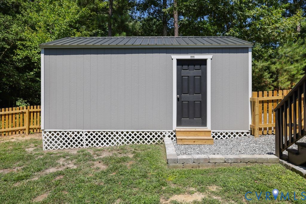 222 Oak Ridge Court Aylett, VA 23009 - Photo 34 of 35 Detached storage shed featuring grey siding, dark
