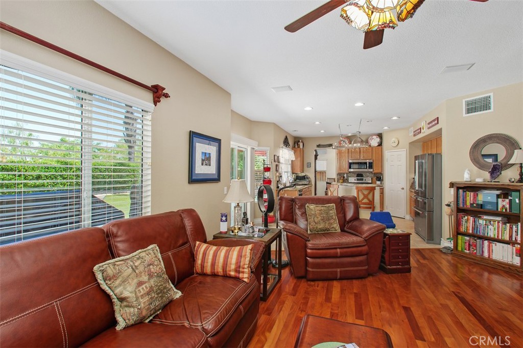 33370 Morning View Drive Temecula, CA 92592 - Photo 14 of 41 a living room with furniture and a book shelf