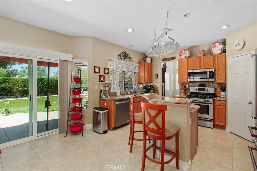 33370 Morning View Drive Temecula, CA 92592 - Photo 15 of 41 a view of a kitchen and dining room