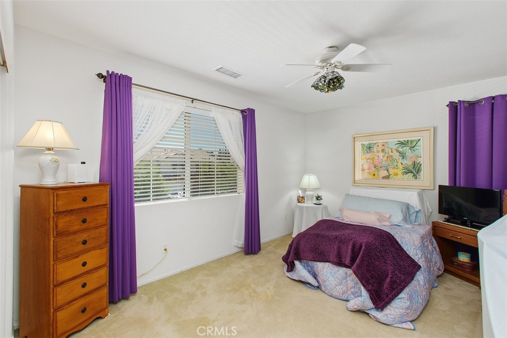 33370 Morning View Drive Temecula, CA 92592 - Photo 21 of 41 a bedroom with a bed and a dresser