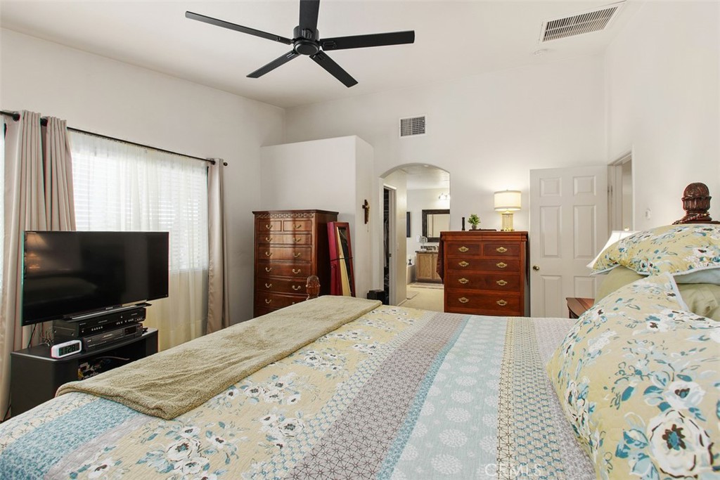 33370 Morning View Drive Temecula, CA 92592 - Photo 24 of 41 a bed room with a bed and a flat screen tv