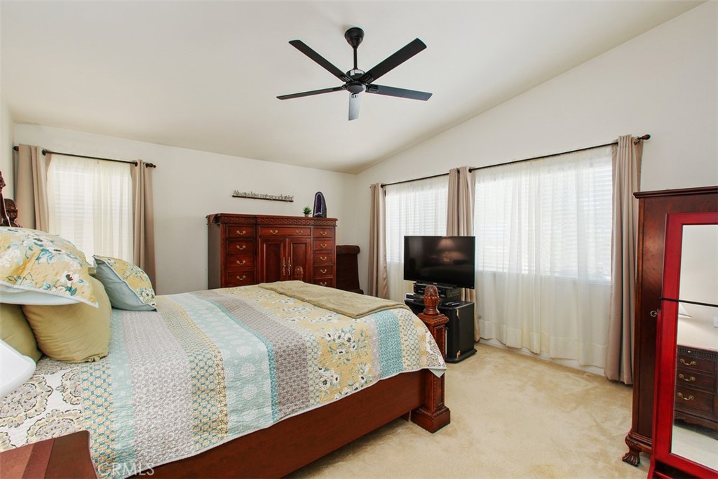 33370 Morning View Drive Temecula, CA 92592 - Photo 25 of 41 a bedroom with a bed and a flat screen tv