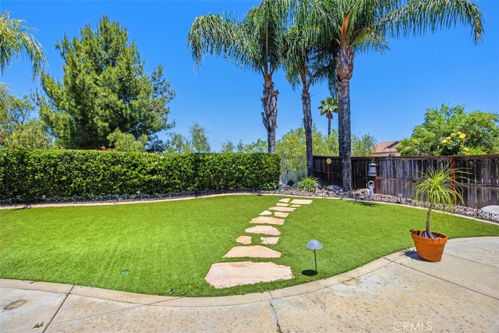 33370 Morning View Drive Temecula, CA 92592 - Photo 33 of 41 a view of a garden with a slide and a lake view