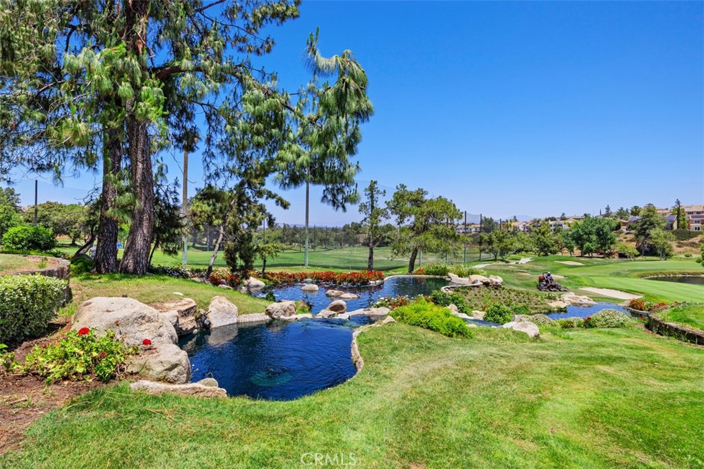 33370 Morning View Drive Temecula, CA 92592 - Photo 40 of 41 a view of a table and chairs in a garden