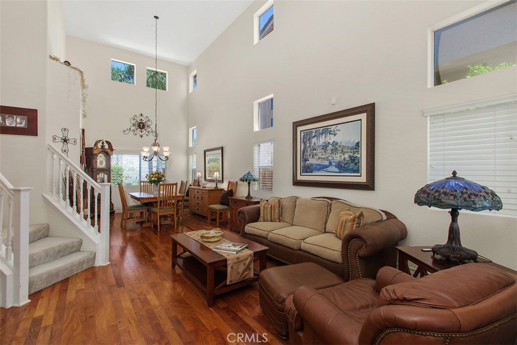 33370 Morning View Drive Temecula, CA 92592 - Photo 6 of 41 a living room with furniture and a wooden floor