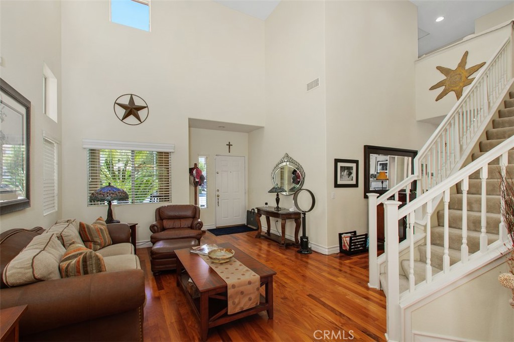 33370 Morning View Drive Temecula, CA 92592 - Photo 7 of 41 a living room with furniture and a floor to ceiling window