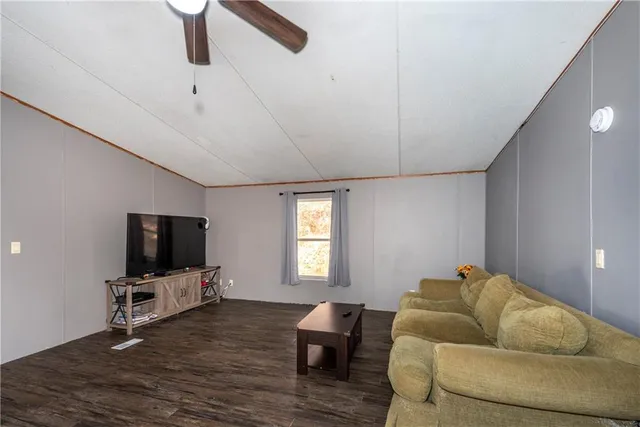 a kitchen with stainless steel appliances granite countertop a refrigerator sink and cabinets
