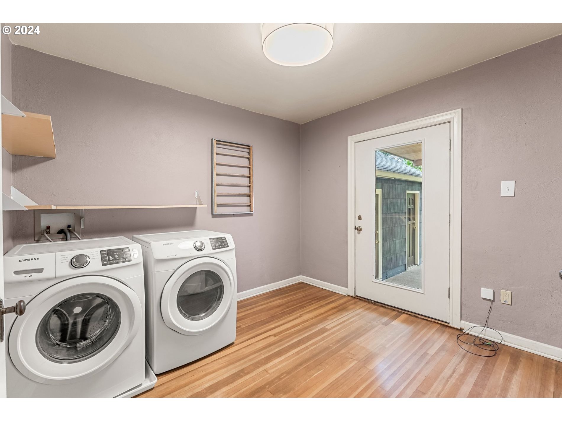 1343 West Broadway Eugene, OR 97402 - Photo 5 of 10 a view of washer and dryer in a room